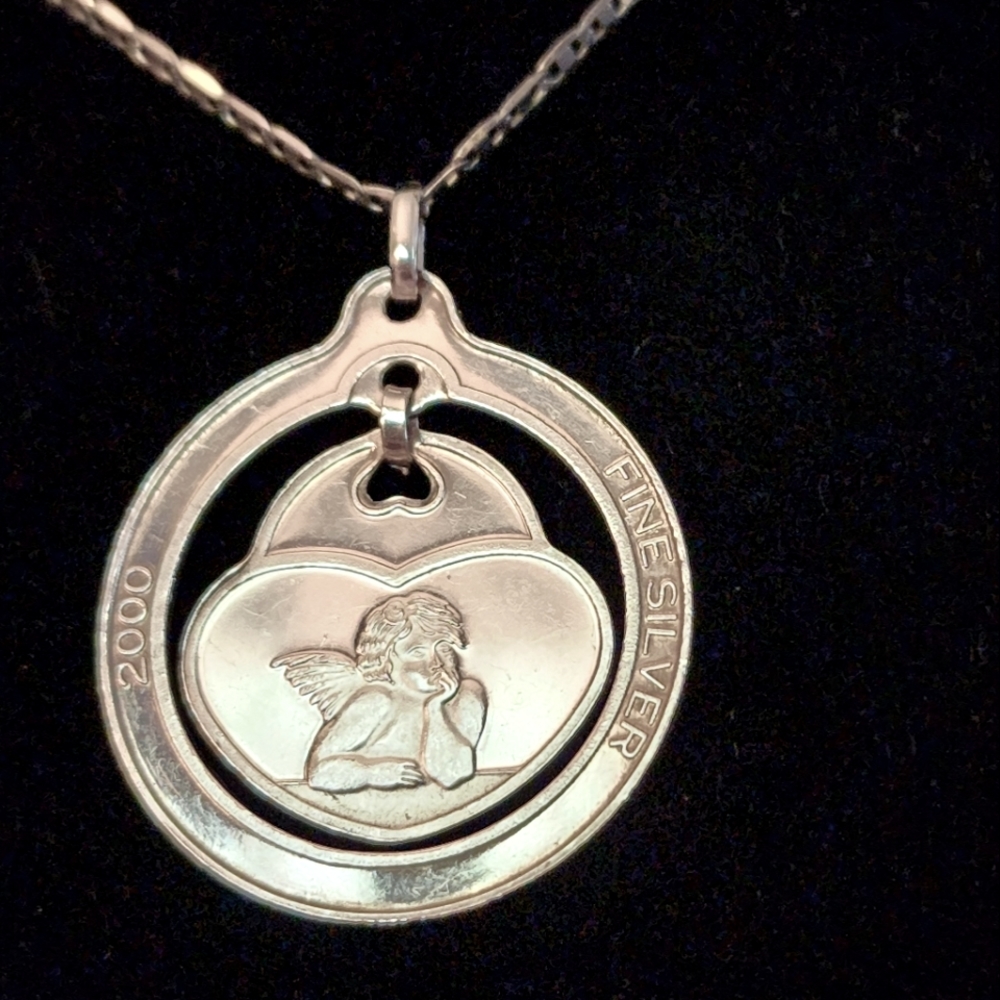 Sterling silver 16" chain with 999 fine silver angel pendant